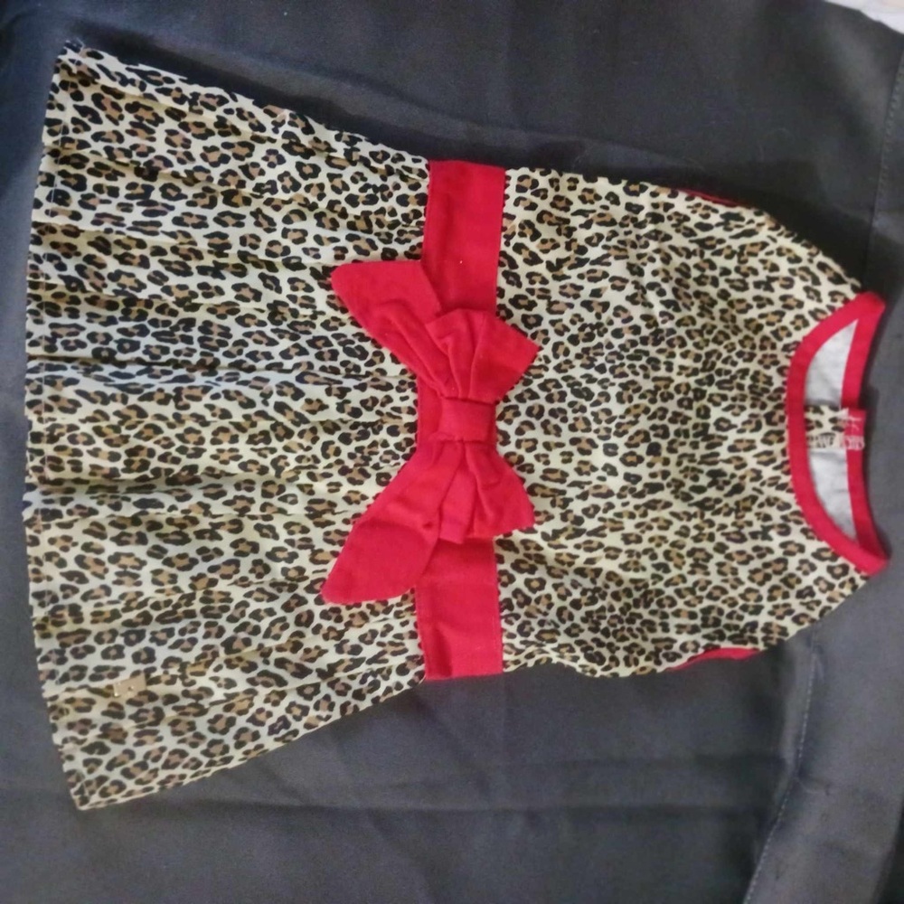 Medium size dress leopard print with red bow